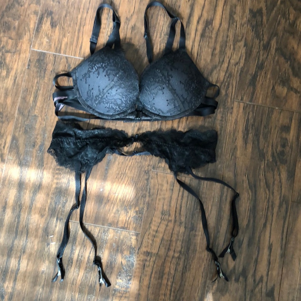 Victoria’s Secret black lace bra and garter belt